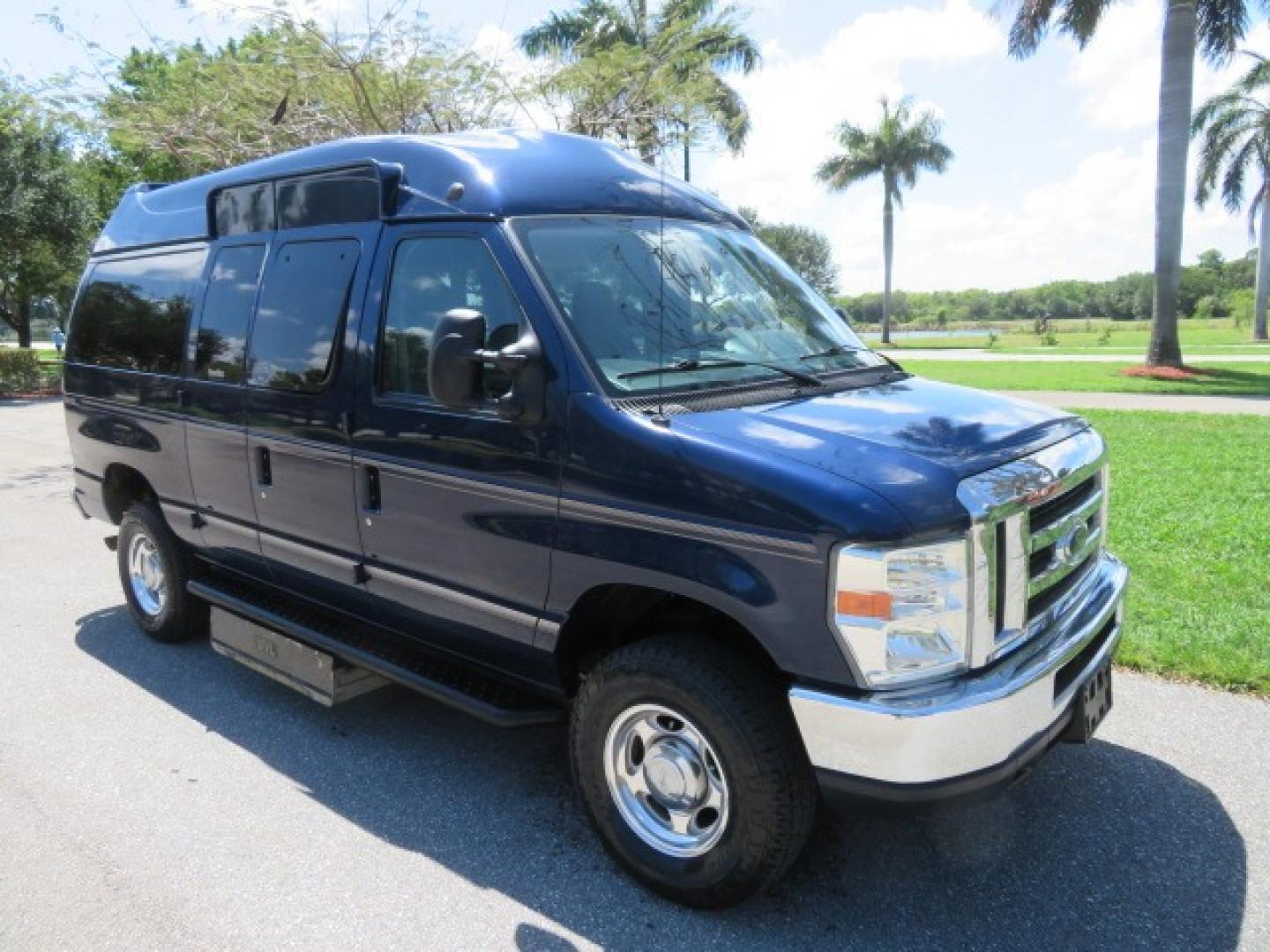 2011 Dark Blue /Gray Ford E-Series Wagon E-350 XLT Super Duty (1FBNE3BS4BD) with an 6.8L V10 SOHC 20V engine, located at 4301 Oak Circle #19, Boca Raton, FL, 33431, (954) 561-2499, 26.388861, -80.084038 - You are looking at a Gorgeous 2011 Ford Econoline E350 XLT Norcal Max High Top Handicap Wheelchair Conversion Van with 6.8L V10, 15K Original Miles, 9 Inch Lowered Floor, Braun UVL Side Entry Wheelchair Lift, Remote Control Power Side Entry Doors, Expanded Side Entry Doors, Q Straint Tie Down, Syste - Photo#19